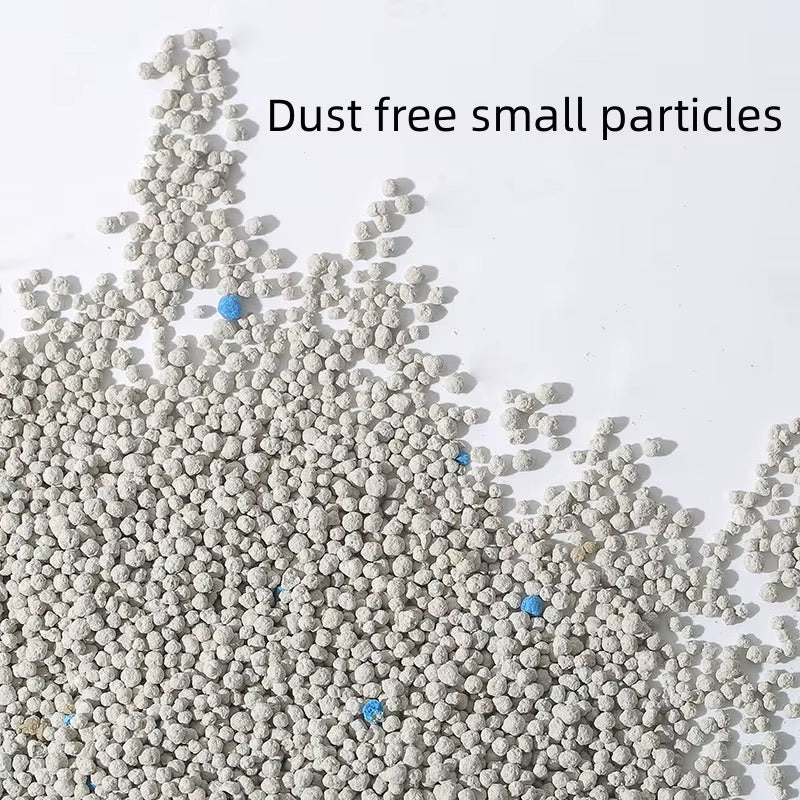 Close-up of small, low-dust white bentonite cat litter granules
